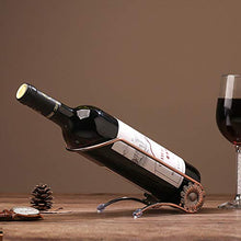 Almabner - Portabottiglie da vino autoportante, elegante in ferro battuto, supporto decorativo per bottiglie di vino rosso, per casa, ristorante e cena, tavolo