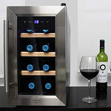 Cecotec Cantinetta Grand Sommelier 800 CoolWood. 8 bottiglie, capacità di 25 l, porta in vetro con telaio in acciaio inox e ripiani in legno, pannello touch e display a LED.