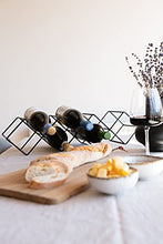 LaLe Living Portabottiglie Kaya in ferro nero per 7 bottiglie di vino con dimensioni 54 x 13 cm per conservare bottiglie di vino e acqua in design geometrico