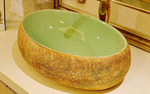 Lavandino del bagno del controsoffitto artistico del bacino del lavabo di Jingdezhen di stile europeo ovale glassato