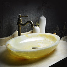 Sopra il bacino di arte del bacino del contatore Bacino di pietra del lavabo della lava di pietra della lava di pietra della lava americana creativa grande Lavabi