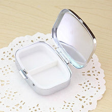Wonque - Contenitore per pillole in metallo, portatile, con specchio interno, motivo casuale, 1 pezzo