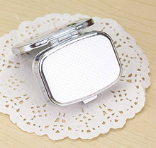 Wonque - Contenitore per pillole in metallo, portatile, con specchio interno, motivo casuale, 1 pezzo