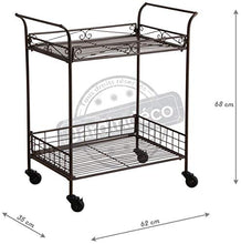 Carrello con ruote in metallo anticato.