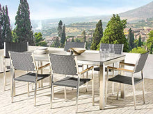Beliani Set da Giardino Tavolo Simil Cemento 6 Sedie Rattan Nero 180 x 90 cm GROSSETO