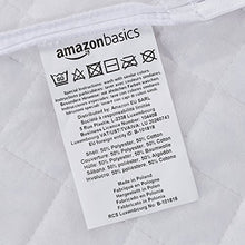 Amazon Basics - Materasso in schiuma con due lati di contatto con classi di rigidità diversa, per bebè e bambini piccoli, 70 x 140 cm